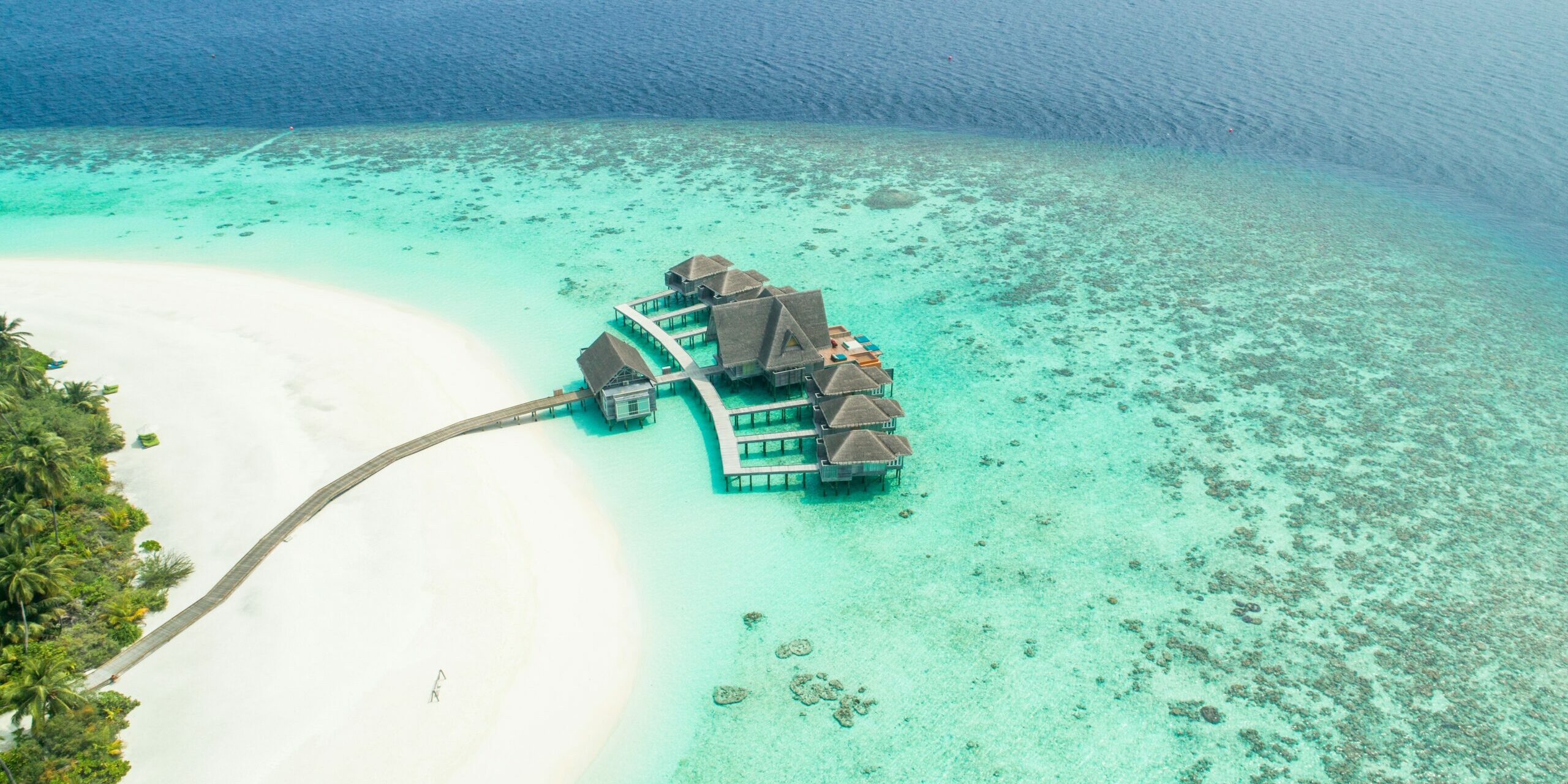 A Record High in February, New Maldivian Tourism Milestone. An aerial of a section at Kihavah Huravalhi Island Baa Atoll, Maldives. Photo Credit: ishan seefromthesky via Unsplash